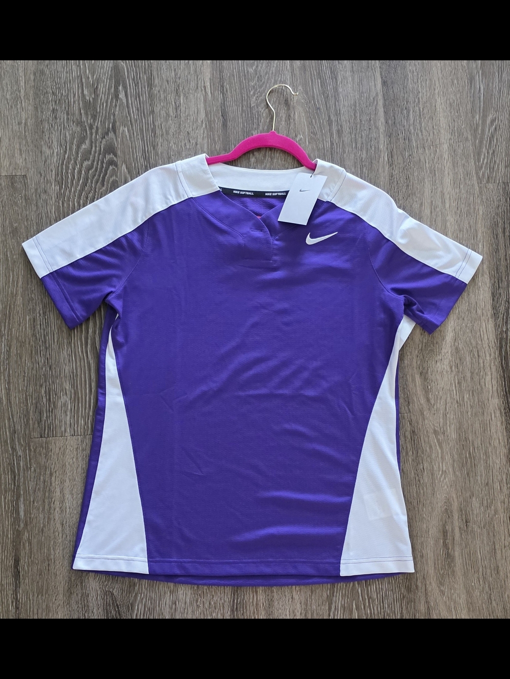 purple and white Nike Dri-Fit Softball shirt with a button collar. Size M